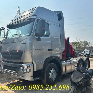 Xe đầu kéo Howo Sitrak 440 gắn cẩu gập Palfinger 10 tấn